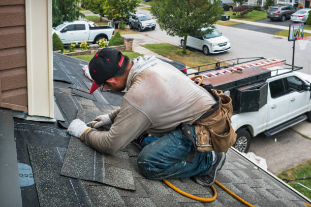 Professional Roof Replacement technician working in Mecca, IN